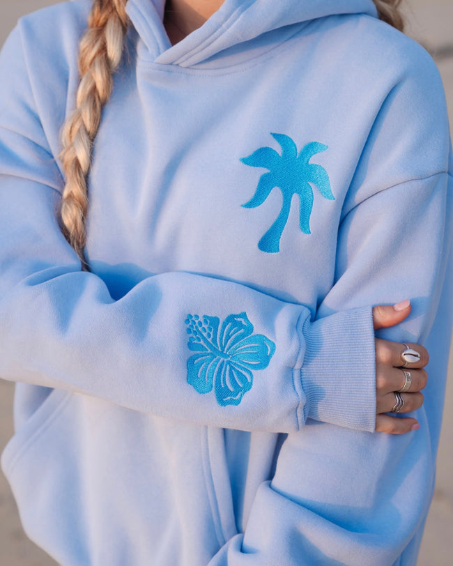 "Everything Comes in Waves” Hoodie in Blue Main Image