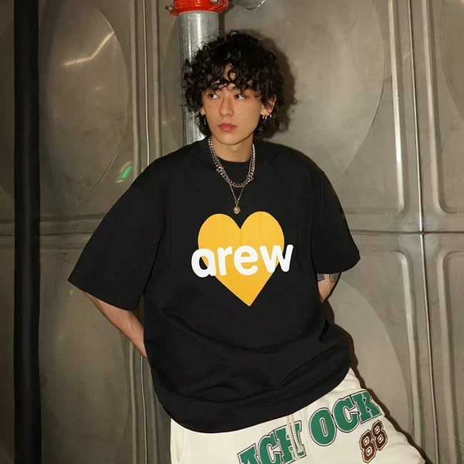 Drew House Yellow Heart Logo Short Sleeve Tee, Black Hover Image